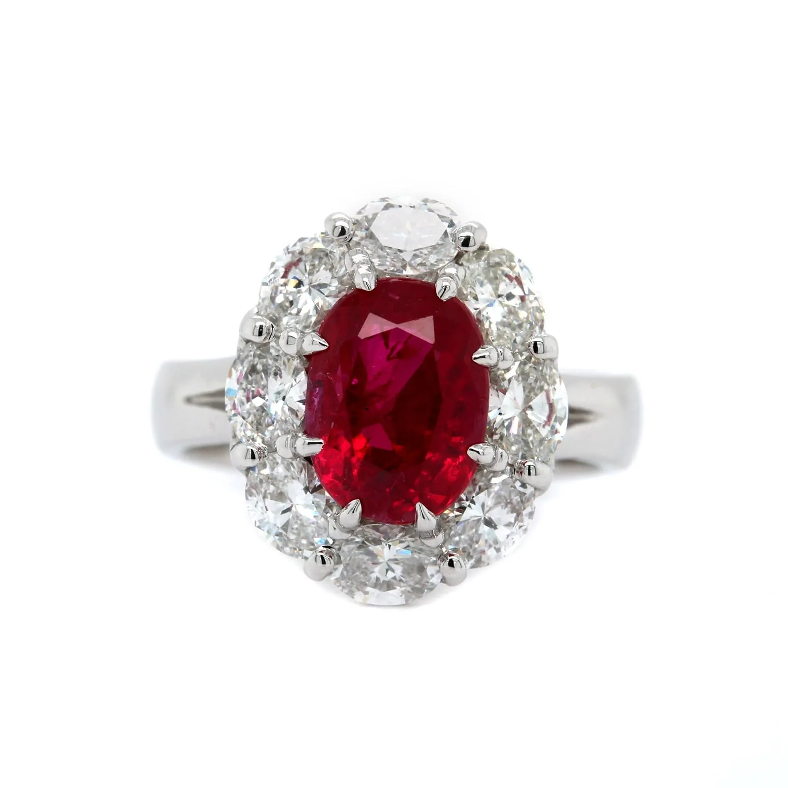 Platinum Oval Ruby and Diamond Halo Ring