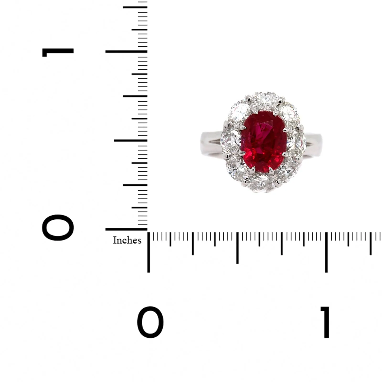 Platinum Oval Ruby and Diamond Halo Ring